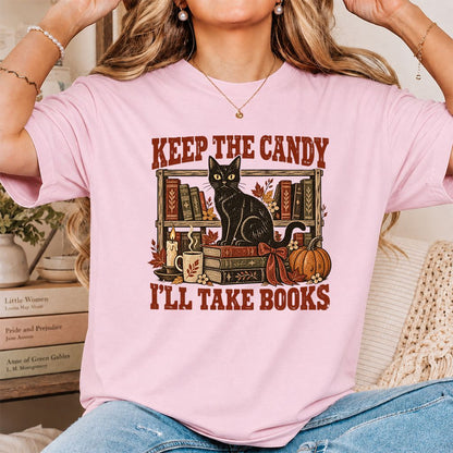 Keep The Candy I'll Take Books Printed T-Shirt | Halloween Reader Gift Light Pink