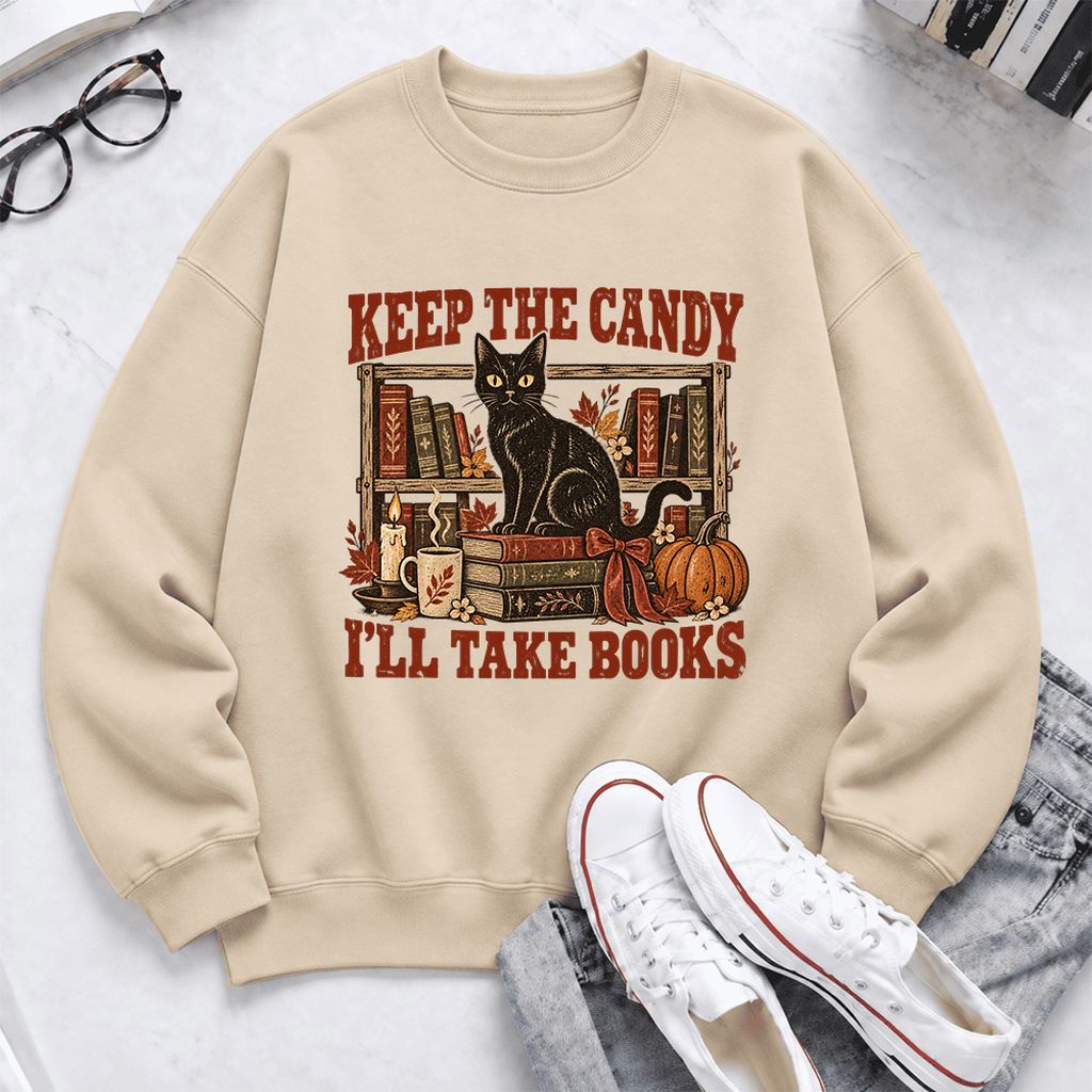 Keep The Candy I'll Take Books Softstyle Sweatshirt | Halloween Reader Gift Sand