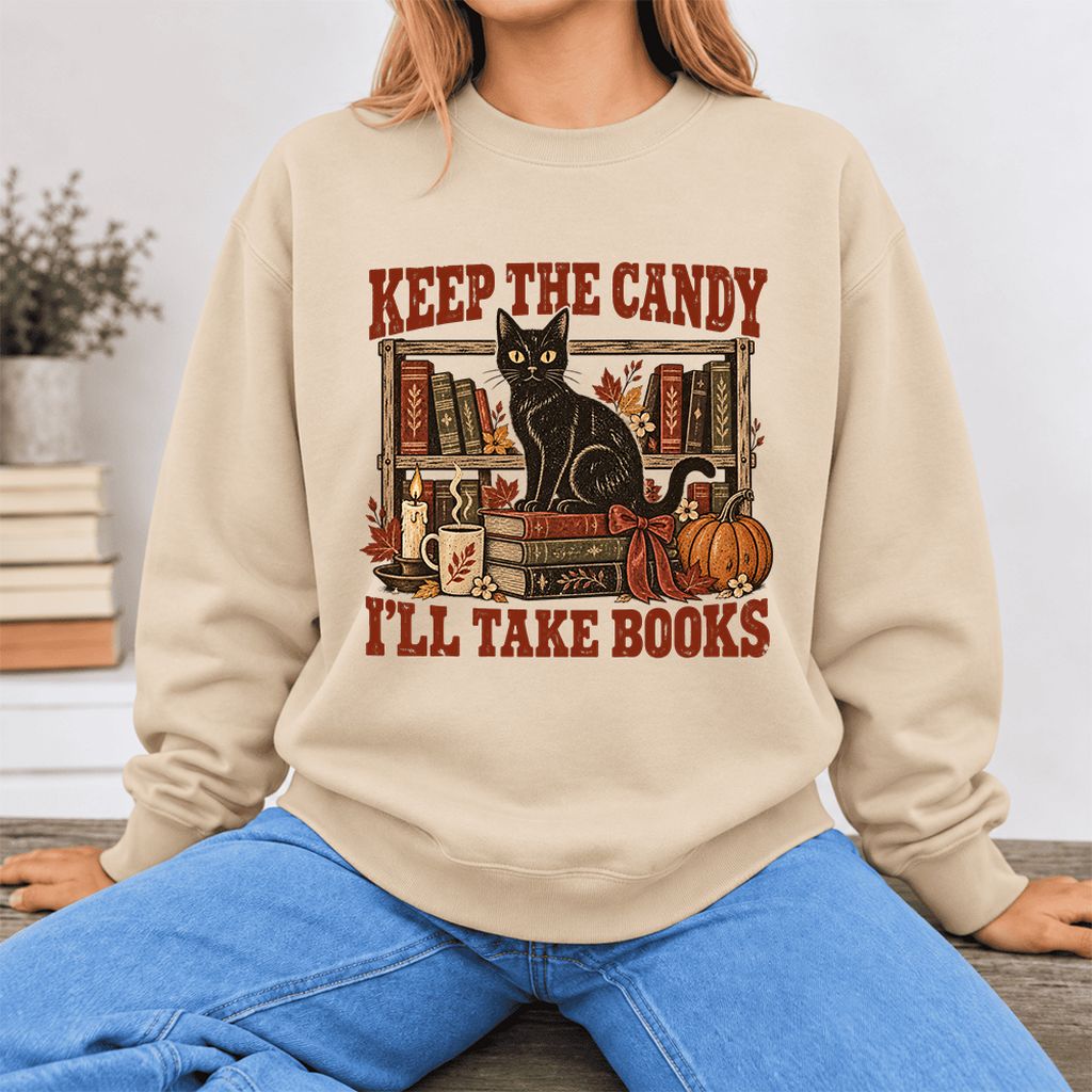 Keep The Candy I'll Take Books Softstyle Sweatshirt | Halloween Reader Gift Sand
