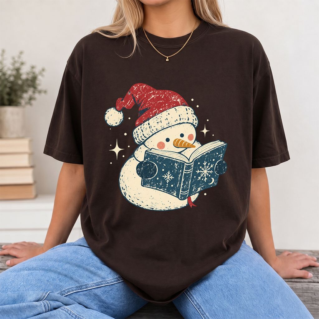 Reading Snowman Christmas Printed T-Shirt | Cozy Christmas Reader Gift Dark Chocolate