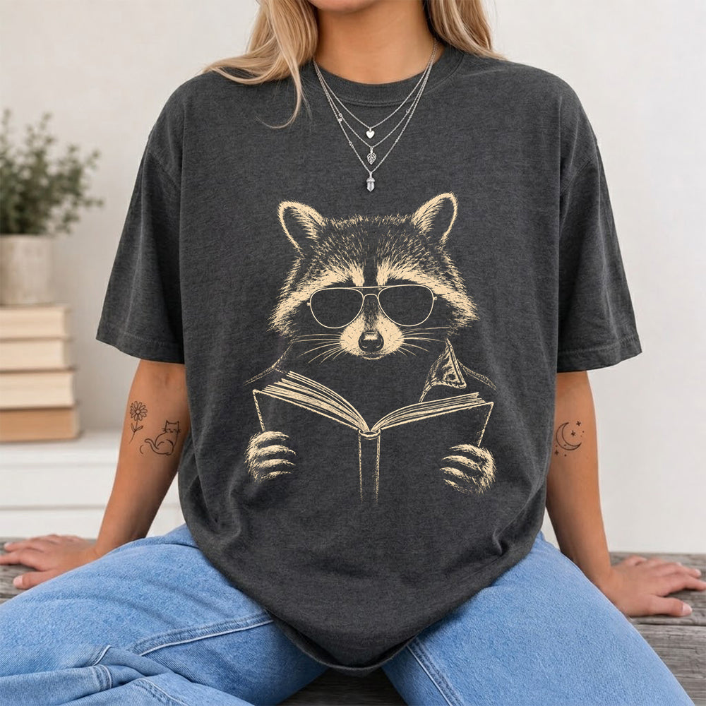 Raccoon Reading Book Softstyle T-Shirt | Book Lover Gift Dark Heather