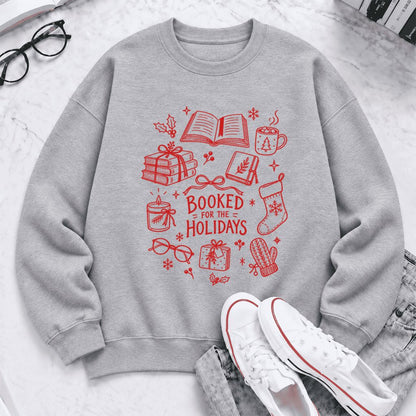 Booked For The Holidays Softstyle Sweatshirt | Christmas Book Lover Gift Sport Grey