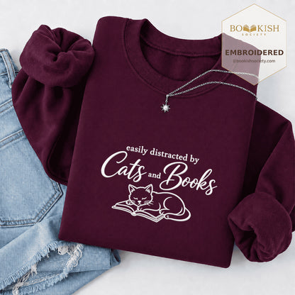 Distracted By Cats And Books Embroidered Sweatshirt | Reader Gift Maroon