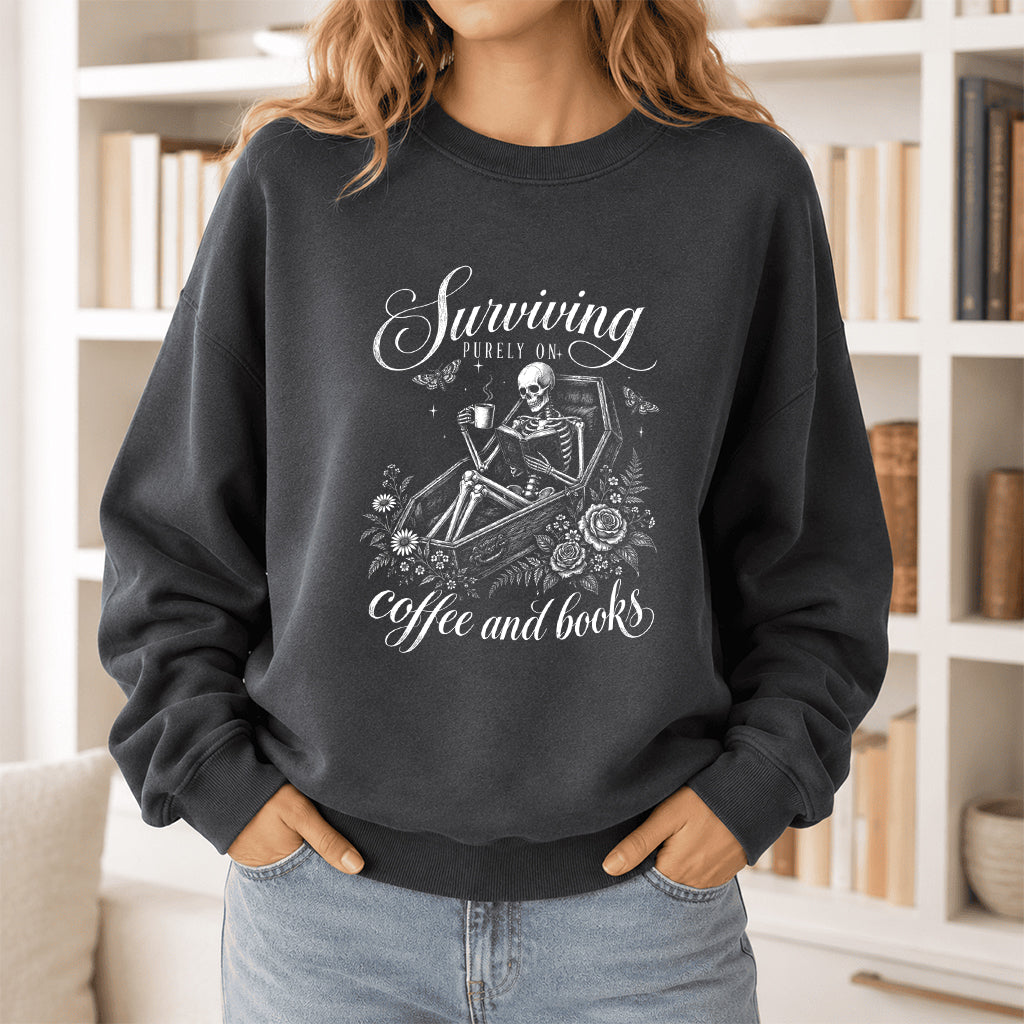 Surviving Purely On Coffee And Books Printed Sweatshirt | Halloween Reader Gift Dark Heather