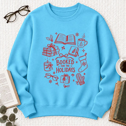 Booked For The Holidays Softstyle Sweatshirt | Christmas Book Lover Gift Sky