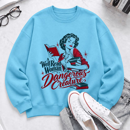 A Well Read Woman Is A Dangerous Creature Softstyle Sweatshirt | Reader Gift Sky