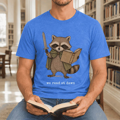 We Read At Dawn Funny Racoon Ultra-Soft Cotton T-Shirt | Playful Reader Gift Heather True Royal