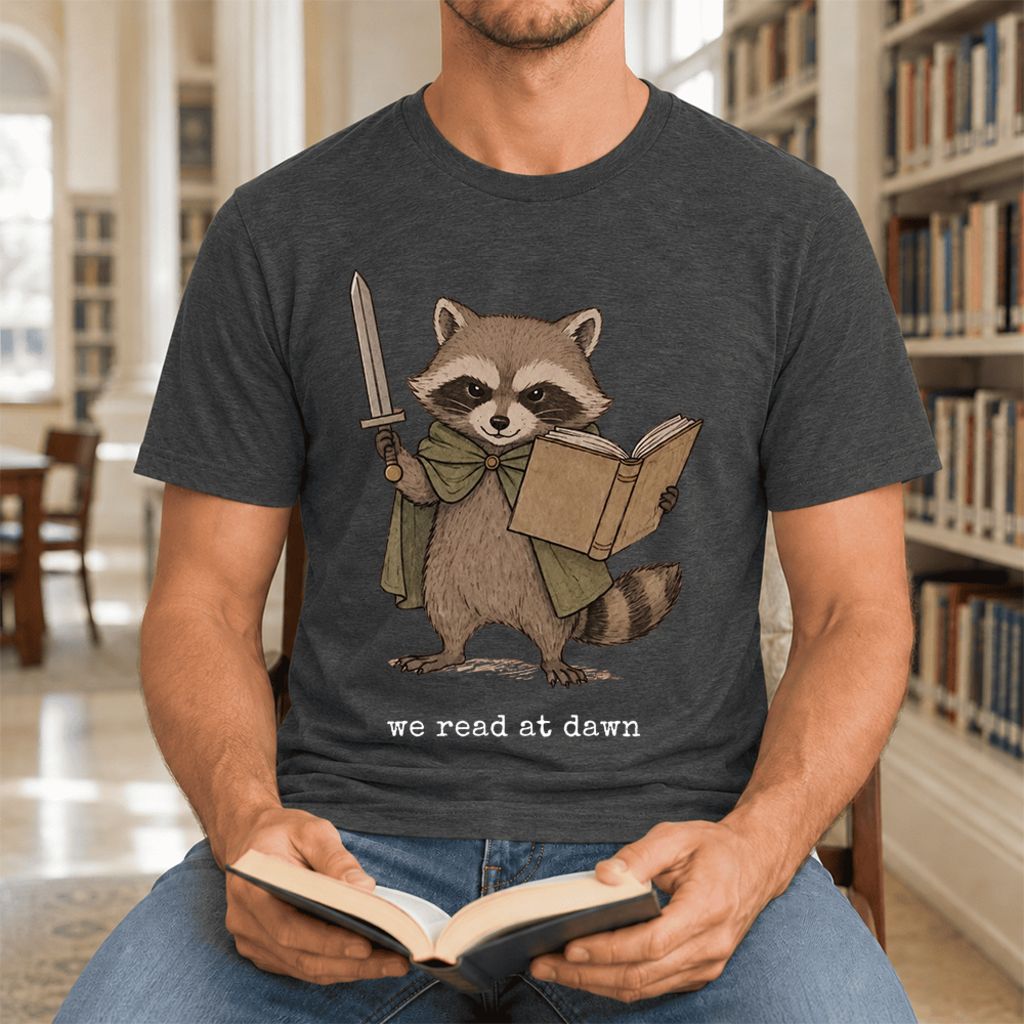 We Read At Dawn Funny Racoon Ultra-Soft Cotton T-Shirt | Playful Reader Gift Dark Grey Heather