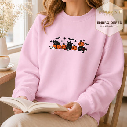 Black Cats And Halloween Embroidered Sweatshirt | Spooky Book Lover Gift Light Pink