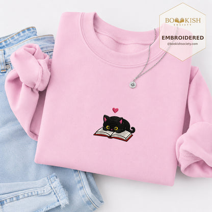 Black Cat and Book Embroidered Sweatshirt | Reader Gift Light Pink