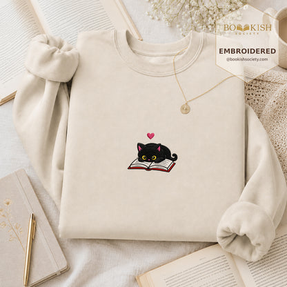 Black Cat and Book Embroidered Sweatshirt | Reader Gift Sand