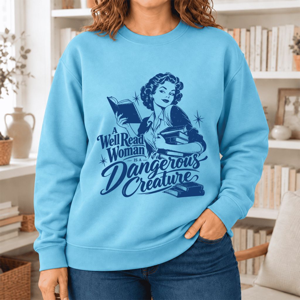 A Well Read Woman Is A Dangerous Creature Softstyle Sweatshirt | Feminist Gift Sky