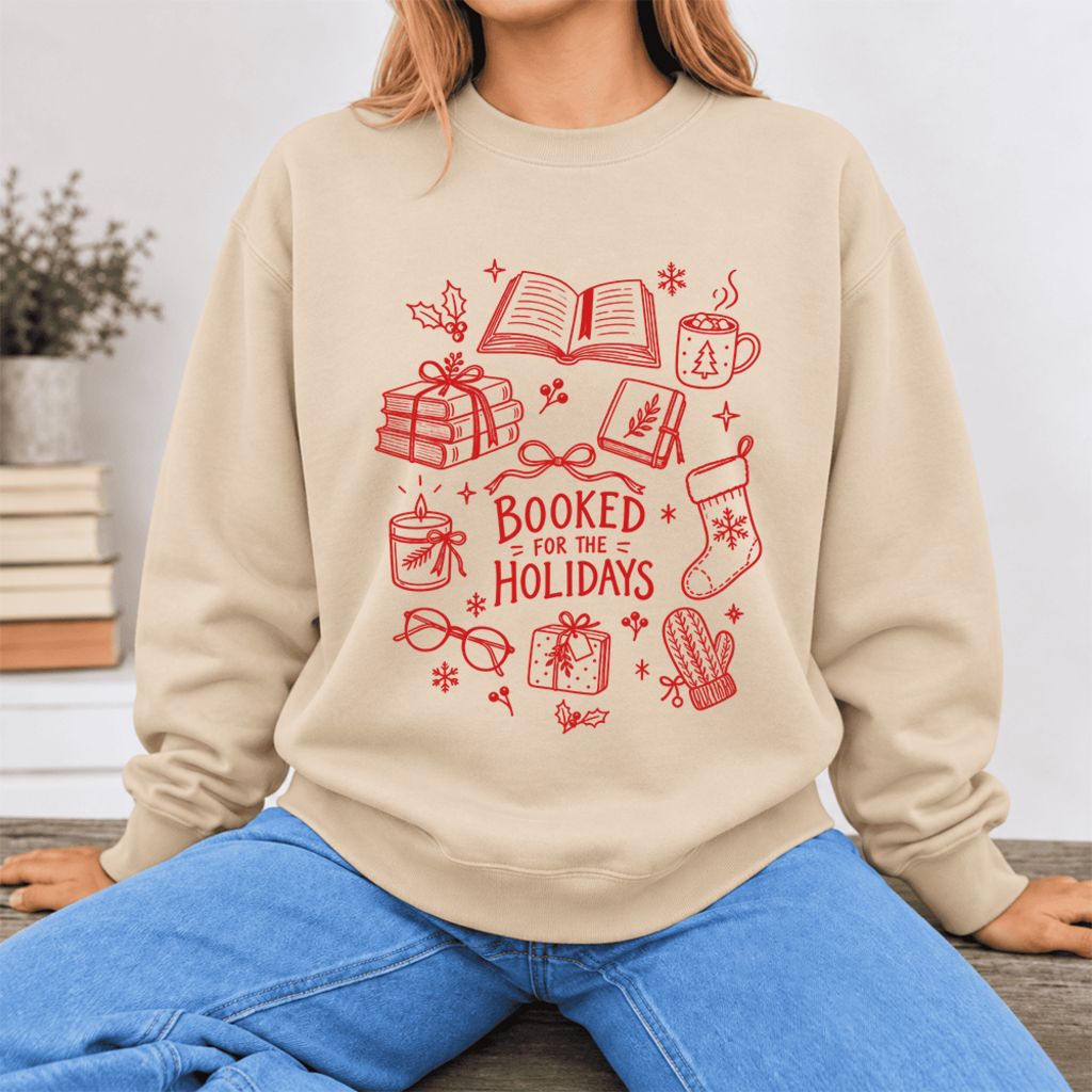 Booked For The Holidays Softstyle Sweatshirt | Christmas Book Lover Gift Sand