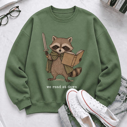 We Read At Dawn Funny Racoon Softstyle Sweatshirt | Cozy Book Lover Gift Military Green