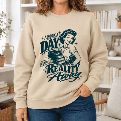 A Book A Day Keeps Reality Away Softstyle Sweatshirt | Cozy Book Lover Gift Sand