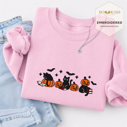 Black Cats And Halloween Embroidered Sweatshirt | Spooky Book Lover Gift Light Pink