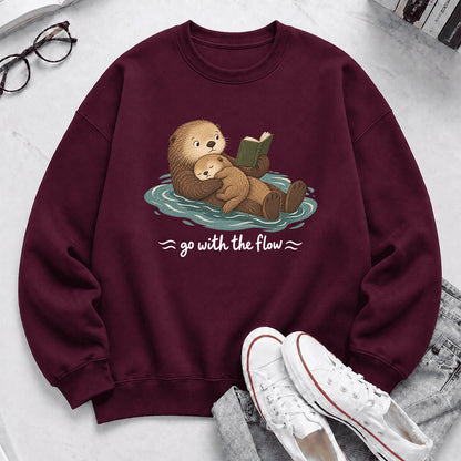 Go With The Flow Otter Reading Crewneck Sweatshirt | Reader Gift Maroon
