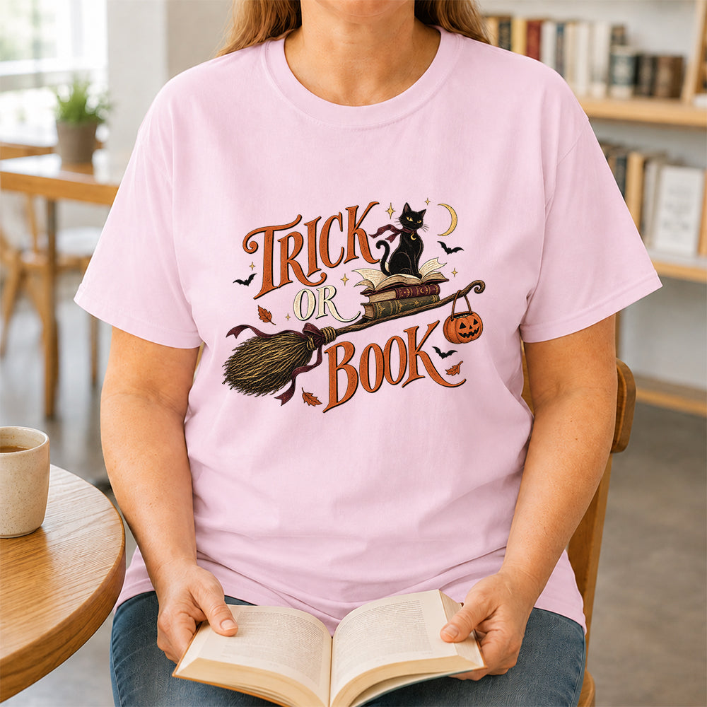 Trick Or Book Black Cat Printed T-Shirt | Halloween Book Lover Gift Light Pink