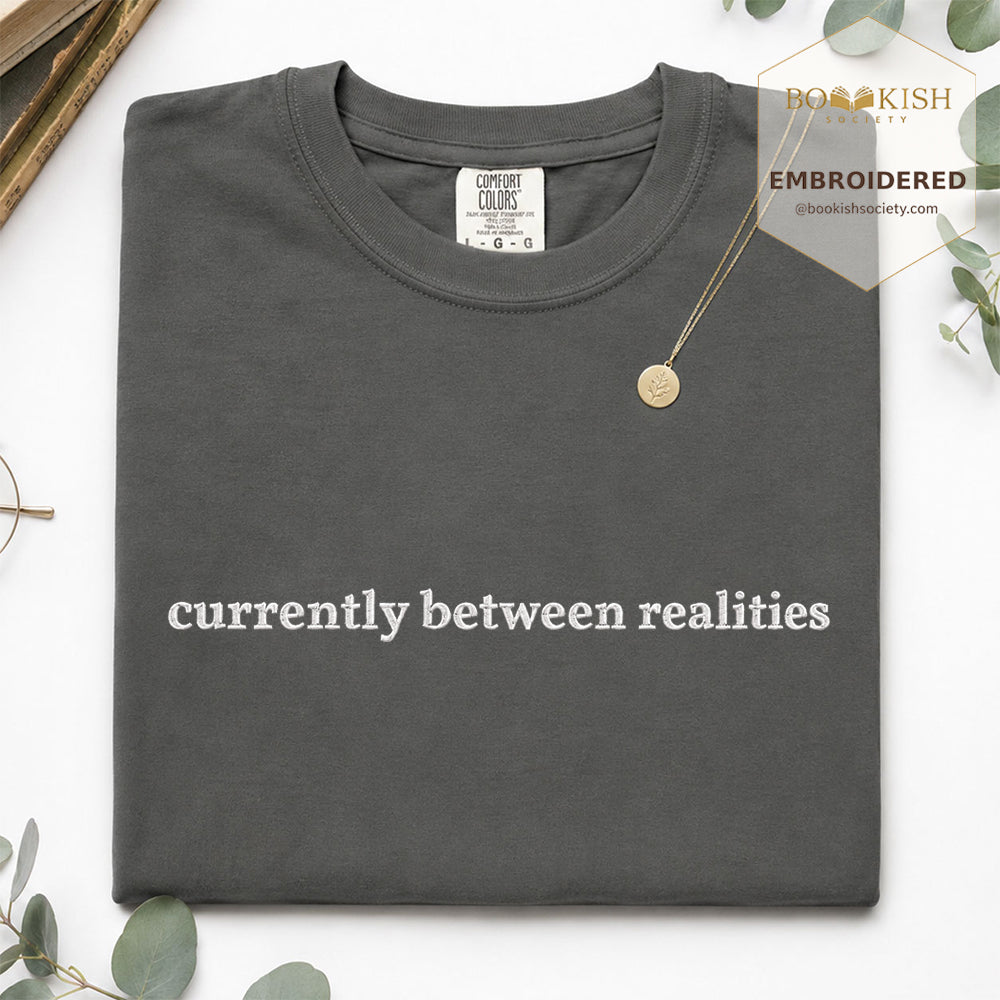 Embroidered Currently Between Realities Comfort Color® T-shirt Book Lover Gift Pepper