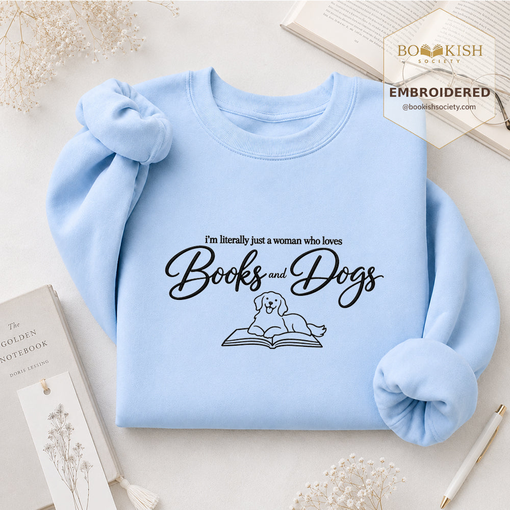 Just A Woman Who Loves Books And Dogs Embroidered Sweatshirt | Dog Lover & Reader Gift Light Blue