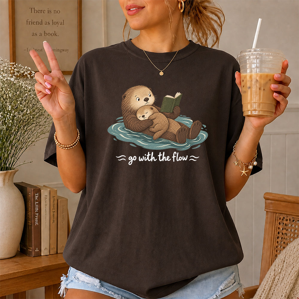 Go With The Flow Otter Reading Softstyle T-Shirt | Book Lover Gift Dark Chocolate
