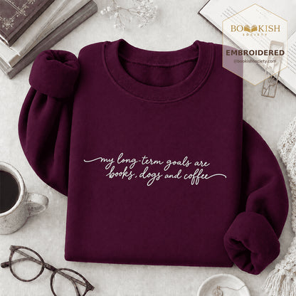 My Long-Term Goals Are Books Dogs And Coffee Embroidered Sweatshirt | Coffee, Dog Lover & Reader Gift Maroon