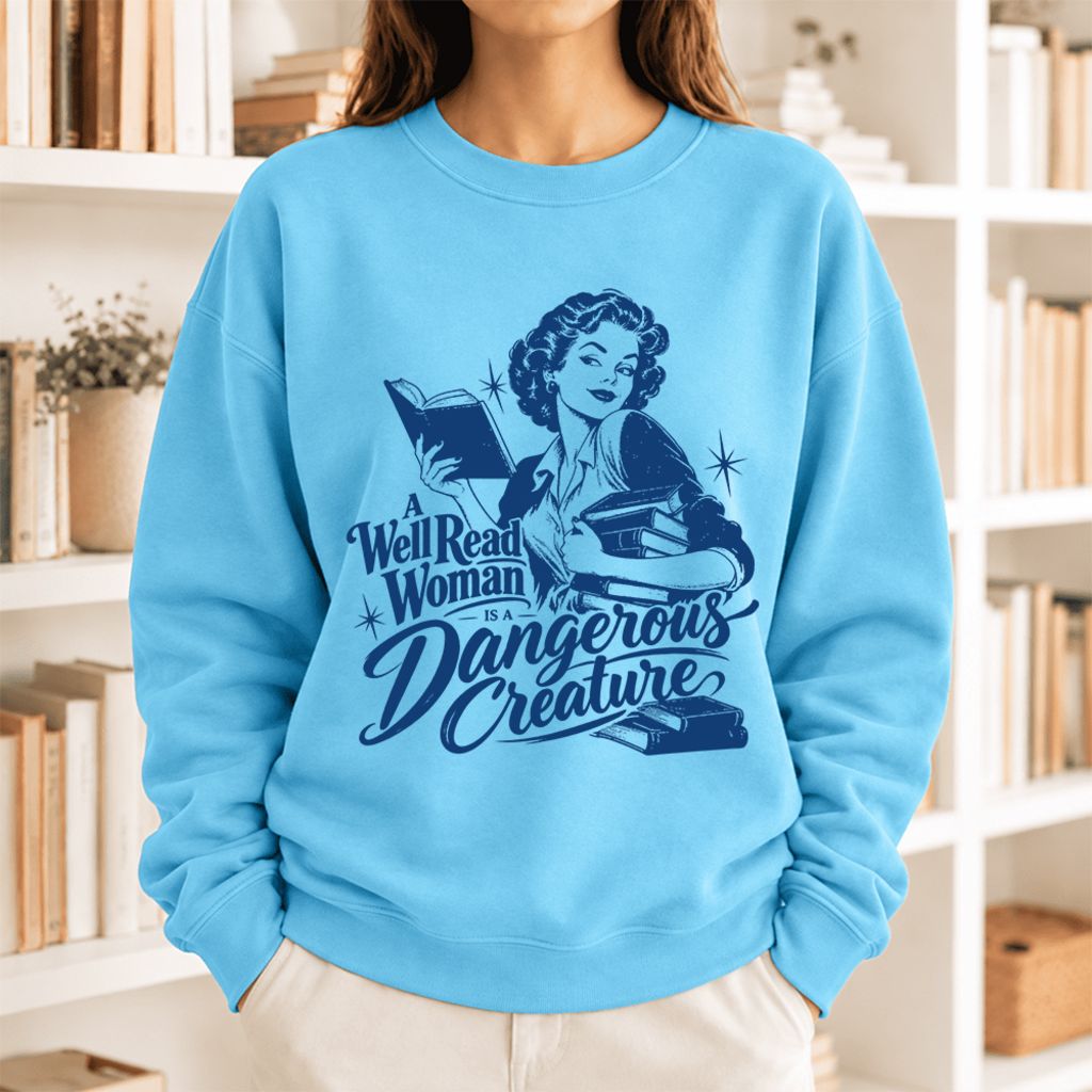 A Well Read Woman Is A Dangerous Creature Softstyle Sweatshirt | Feminist Gift Sky