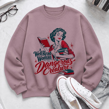A Well Read Woman Is A Dangerous Creature Softstyle Sweatshirt | Reader Gift Paragon