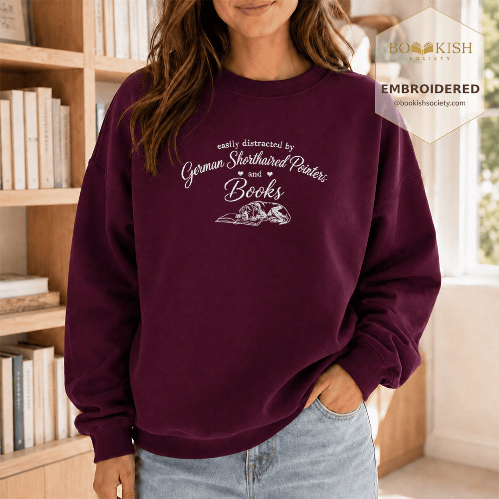 Easily Distracted By German Shorthaired Pointers And Books Embroidered Sweatshirt | Reader Gift Maroon