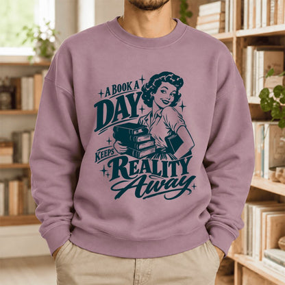 A Book A Day Keeps Reality Away Softstyle Sweatshirt | Cozy Book Lover Gift Paragon