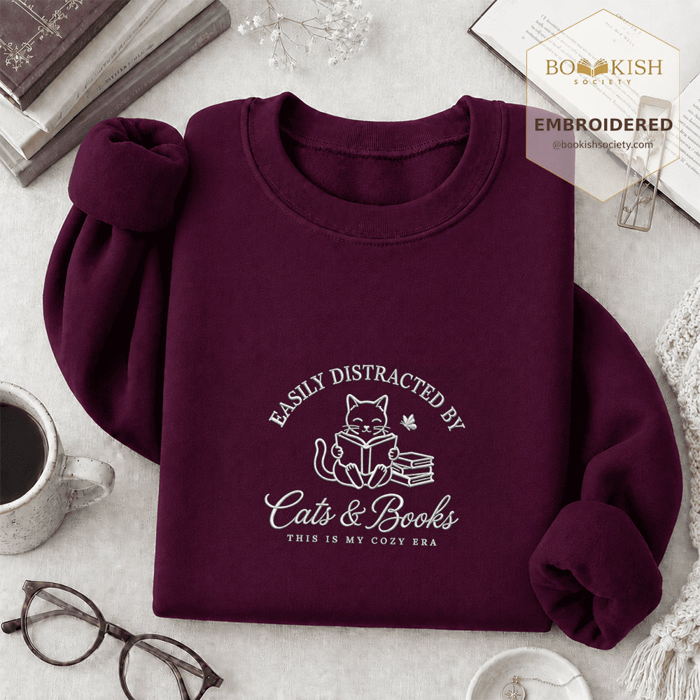 Easily Distracted By Cats And Books V2 Embroidered Sweatshirt | Reader Gift Maroon