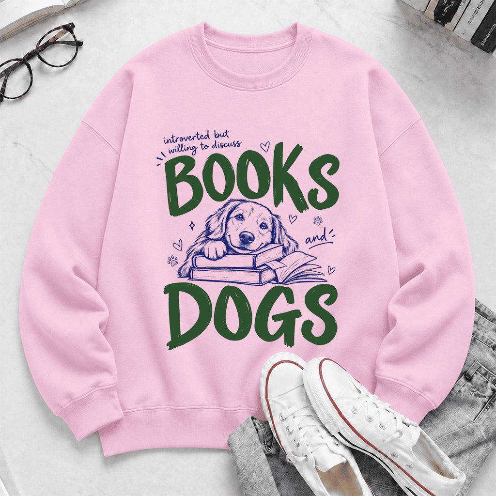 Introverted But Willing To Discuss Books And Dogs Crewneck Sweatshirt | Dog Lover & Reader Gift Light Pink