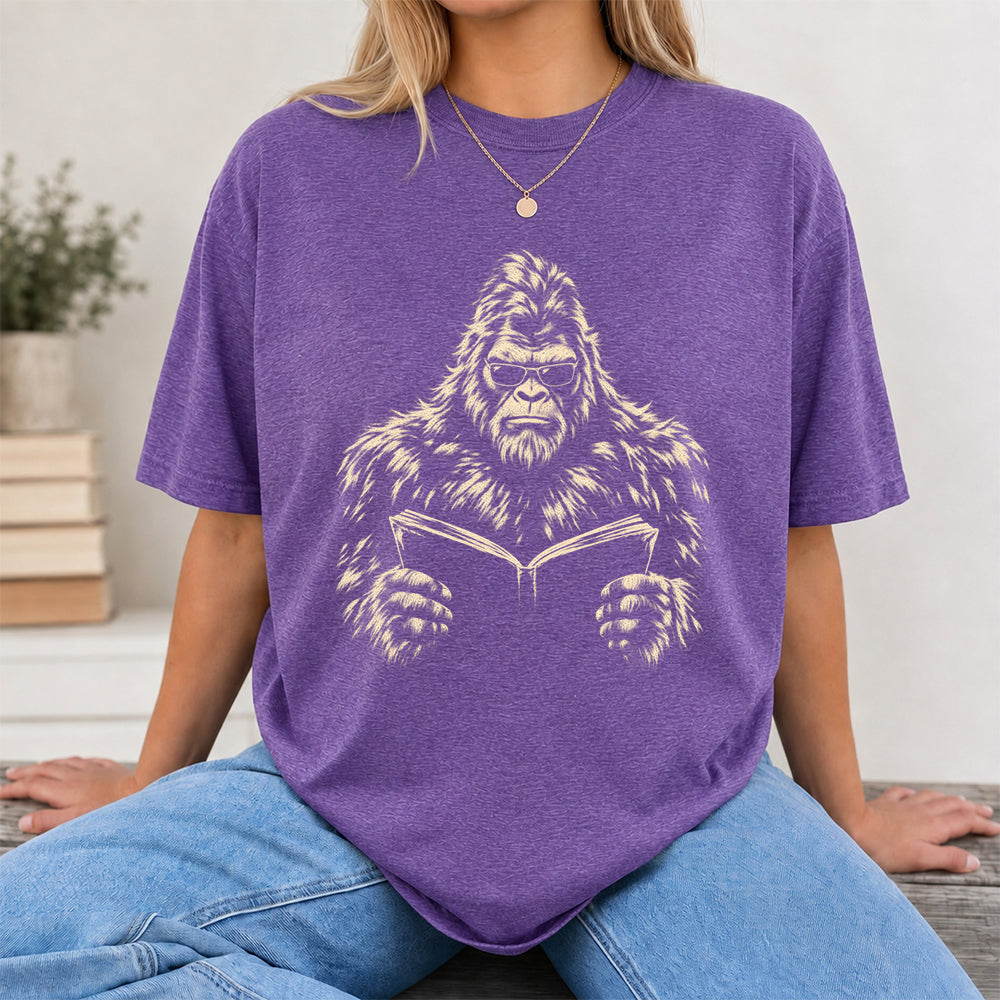 Big Foot Reading Book Softstyle T-Shirt | Book Lover Gift Heather Purple