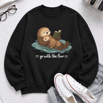Go With The Flow Otter Reading Crewneck Sweatshirt | Reader Gift Black