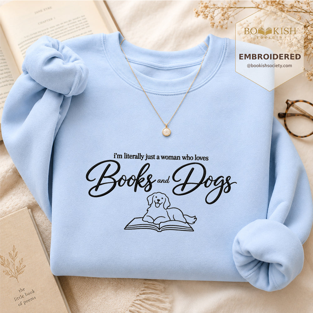 Just A Woman Who Loves Books And Dogs Embroidered Sweatshirt | Dog Lover & Reader Gift Light Blue