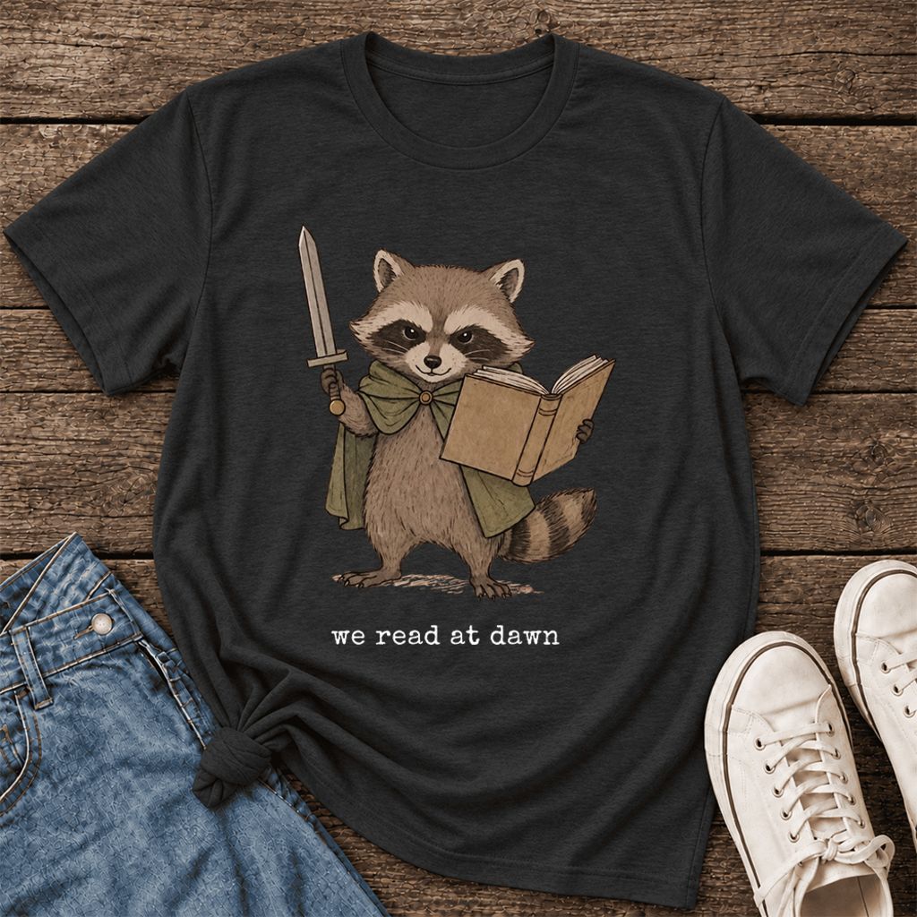 We Read At Dawn Funny Racoon Ultra-Soft Cotton T-Shirt | Playful Reader Gift Black Heather