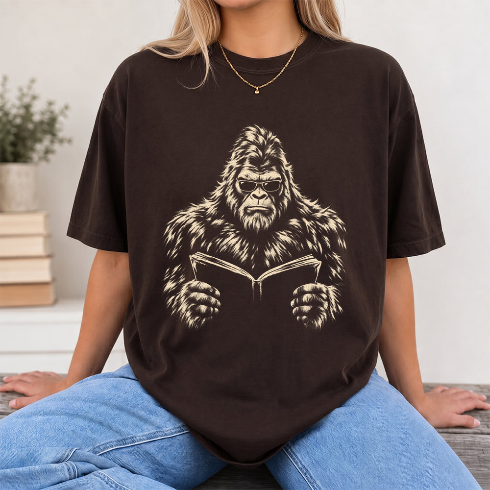 Big Foot Reading Book Softstyle T-Shirt | Book Lover Gift Dark Chocolate