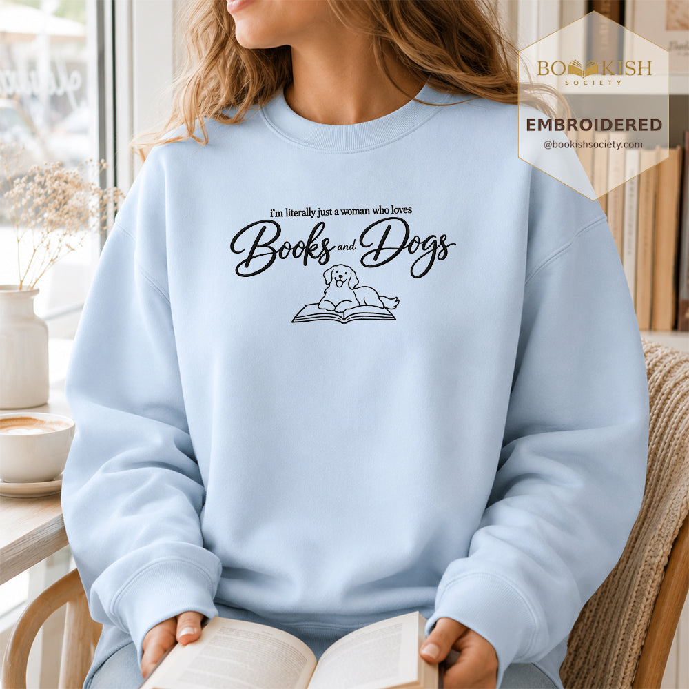 Just A Woman Who Loves Books And Dogs Embroidered Sweatshirt | Dog Lover & Reader Gift Light Blue
