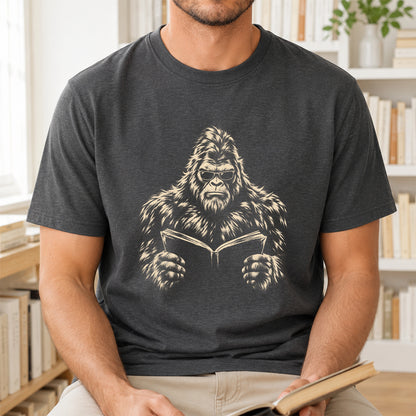 Big Foot Reading Book Softstyle T-Shirt | Book Lover Gift Dark Heather