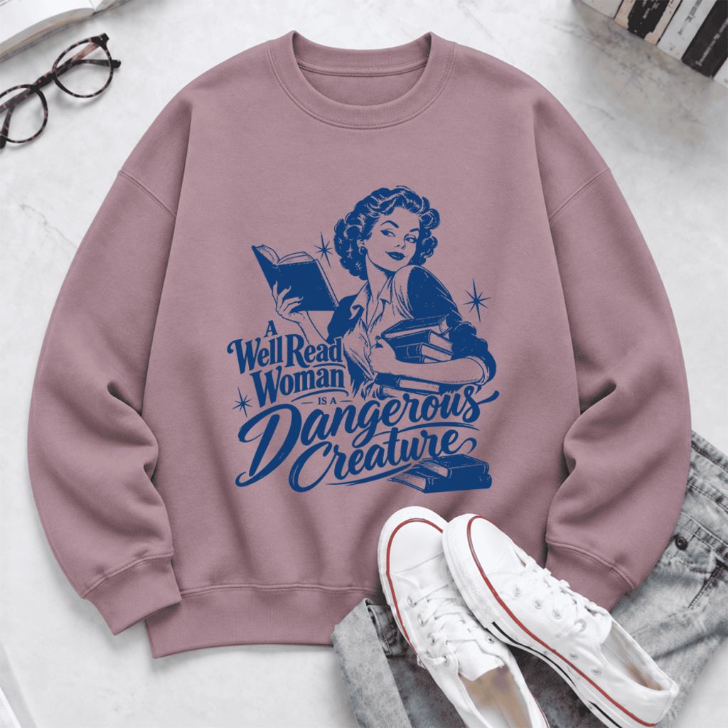 A Well Read Woman Is A Dangerous Creature Softstyle Sweatshirt | Feminist Gift Paragon