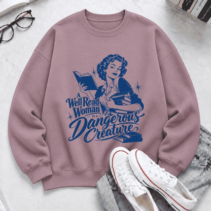 A Well Read Woman Is A Dangerous Creature Softstyle Sweatshirt | Feminist Gift Paragon
