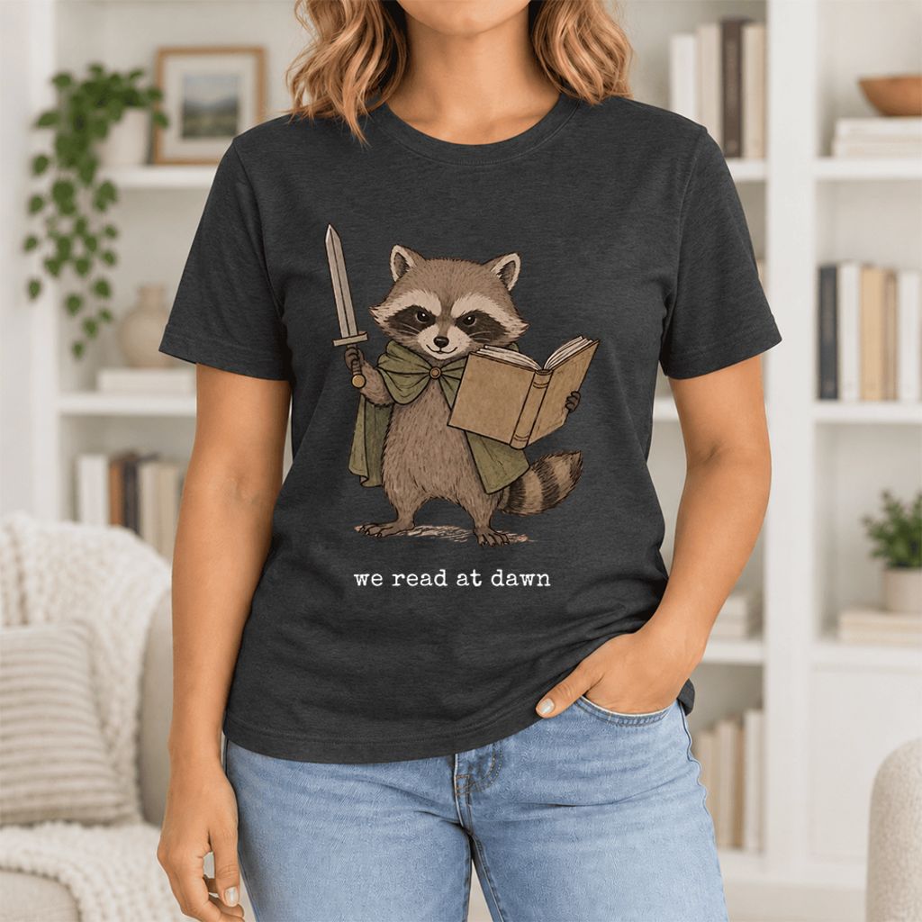 We Read At Dawn Funny Racoon Ultra-Soft Cotton T-Shirt | Playful Reader Gift Black Heather