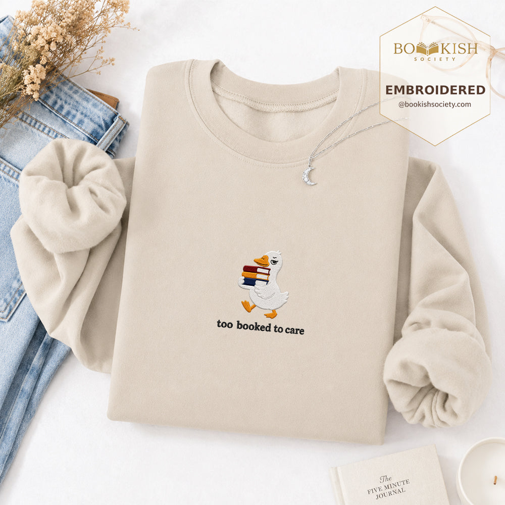 Too Booked To Care Embroidered Sweatshirt | Reader Gift Sand