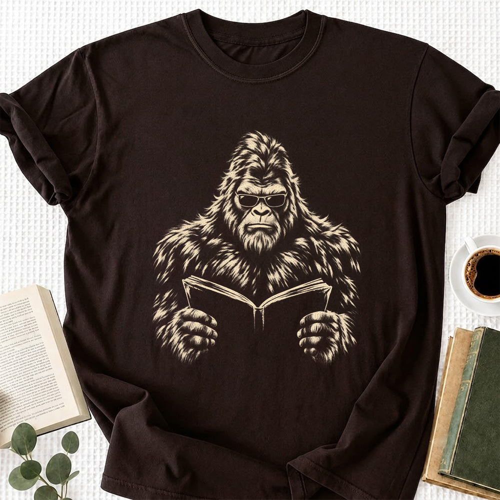 Big Foot Reading Book Softstyle T-Shirt | Book Lover Gift Dark Chocolate