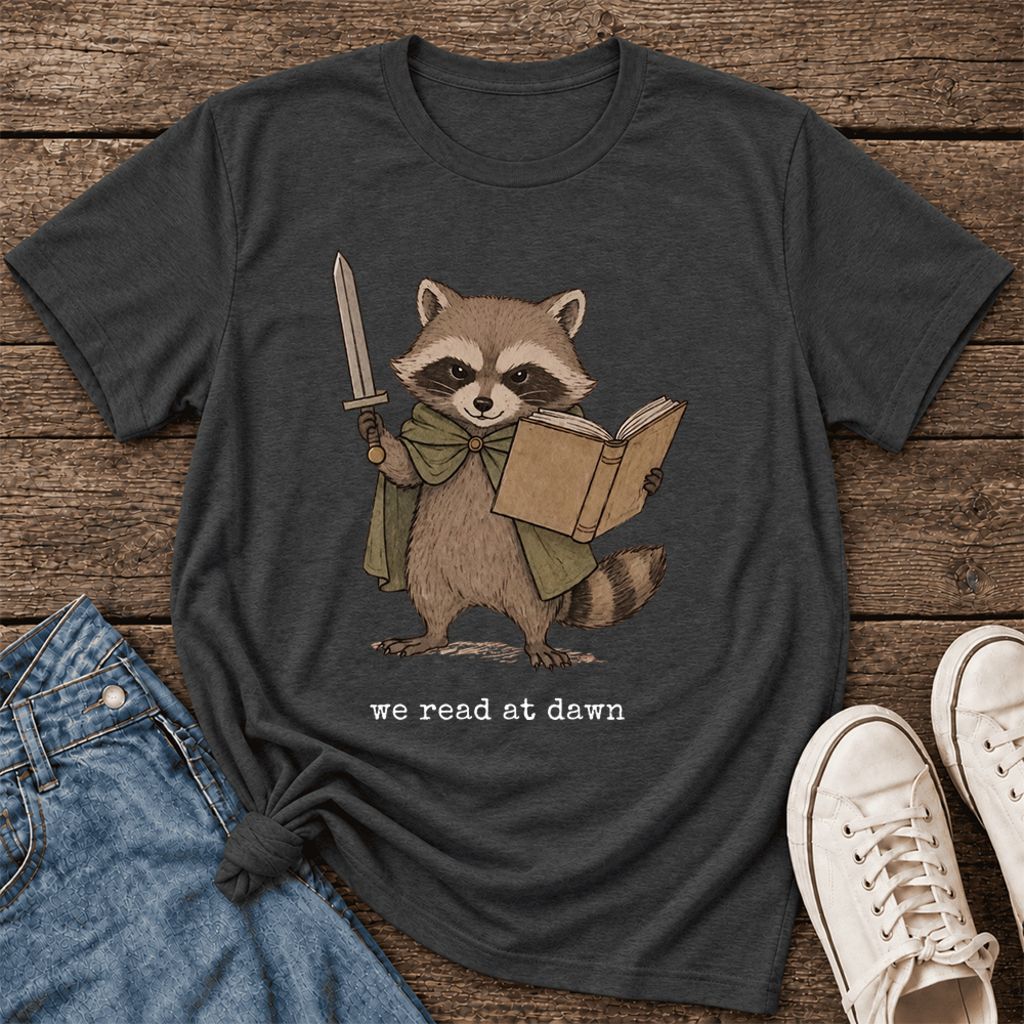 We Read At Dawn Funny Racoon Ultra-Soft Cotton T-Shirt | Playful Reader Gift Dark Grey Heather