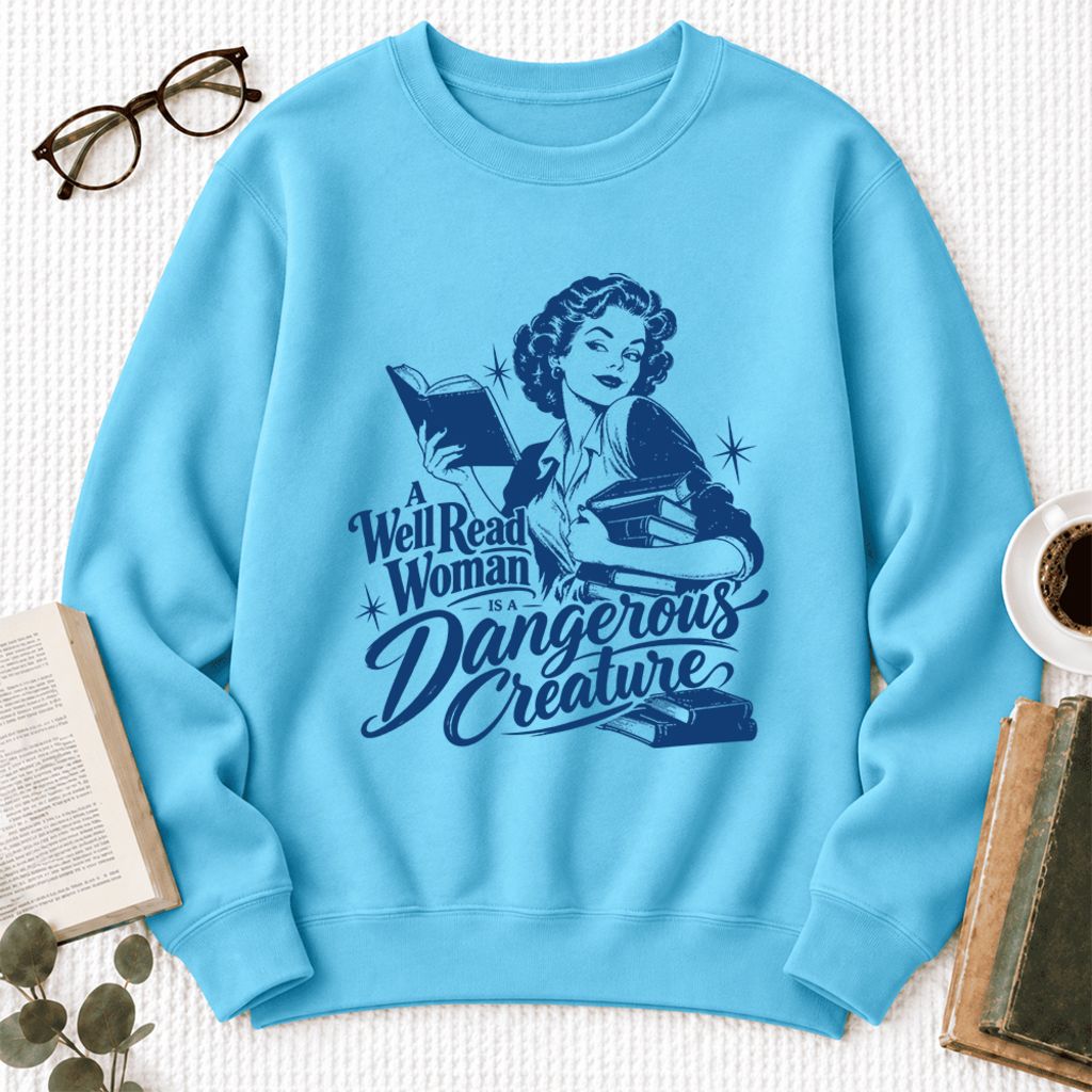 A Well Read Woman Is A Dangerous Creature Softstyle Sweatshirt | Feminist Gift Sky