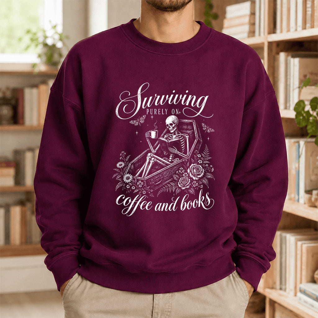 Surviving Purely On Coffee And Books Printed Sweatshirt | Halloween Reader Gift Maroon