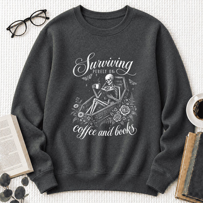 Surviving Purely On Coffee And Books Printed Sweatshirt | Halloween Reader Gift Dark Heather