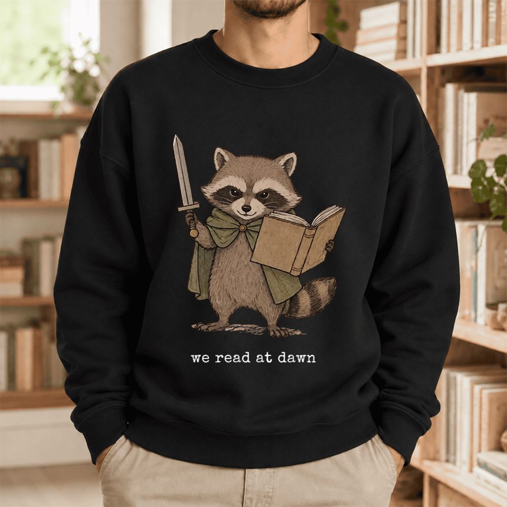 We Read At Dawn Funny Racoon Softstyle Sweatshirt | Cozy Book Lover Gift Black