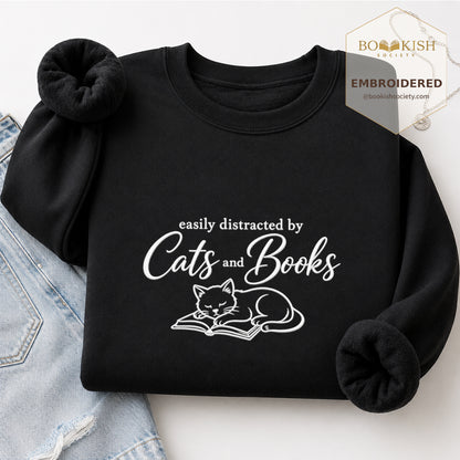 Distracted By Cats And Books Embroidered Sweatshirt | Reader Gift Black